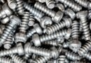 Close-up of a heap of bright silver plated self-tapping screws
